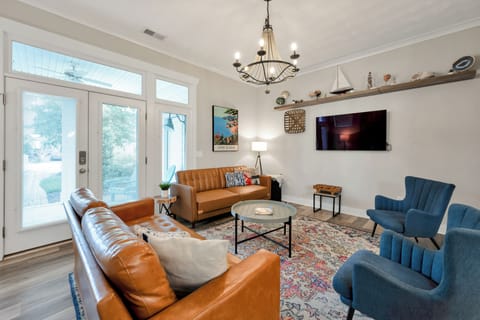 Spacious and inviting living room, open to the kitchen. 