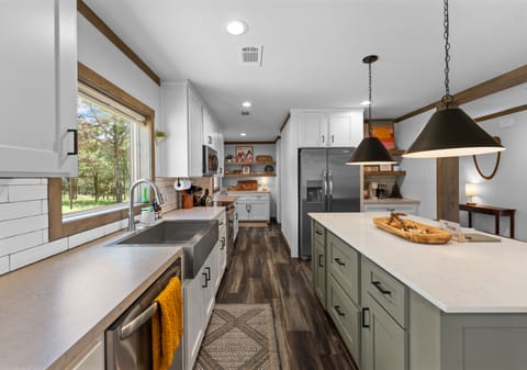 At the back of the kitchen you'll find cutting boards, drinking glasses and more