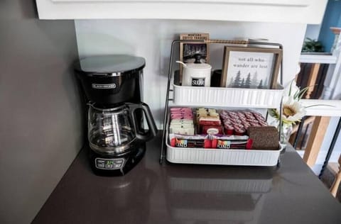 We provide coffee, cream and tea. There is also honey and sugar in the cupboard.