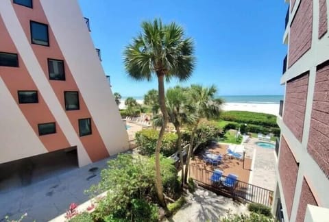 Side porch looks to the beach