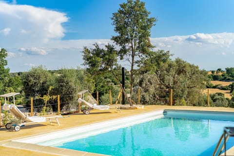 Water, Cloud, Sky, Swimming Pool, Plant, Shade, Tree, Outdoor Furniture, Leisure, Real Estate