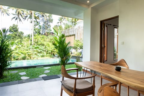 Deluxe Villa | Private kitchen | Fridge, stovetop, electric kettle, toaster