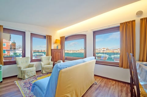 Apartment | Living area | 32-inch flat-screen TV with digital channels