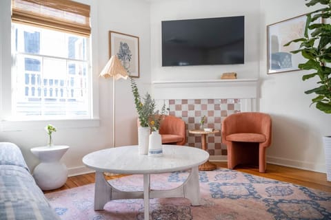 Welcome to your downtown Charleston rental! Explore all things downtown by foot! Spacious living room with seating for your entire group!