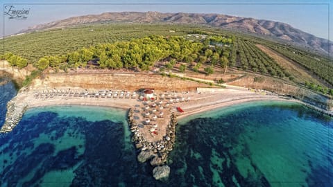 Private beach nearby, black sand, sun loungers, beach umbrellas