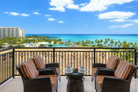 Wake up to turquoise waters and swaying palms from your private oceanfront balcony, where morning coffee tastes better with paradise as your backdrop.