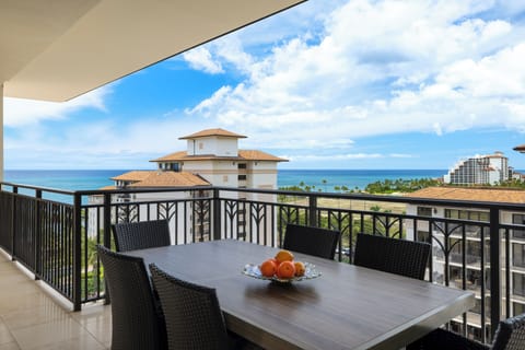 Panoramic ocean views from this spacious lanai with outdoor dining for six guests.