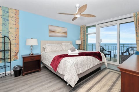 Bright, oceanfront bedroom with a king bed and stunning Atlantic views. 