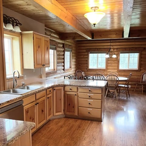 Fully stocked kitchen with all the equipment you need for cooking.