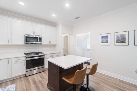 Fully equipped kitchen with all cooking and baking supplies, gas stove, and dishwasher. Kids dishes available.Dining area seats 6 with 4 at the table and 2 at kitchen island. Regular drip coffee maker. We provide filters.