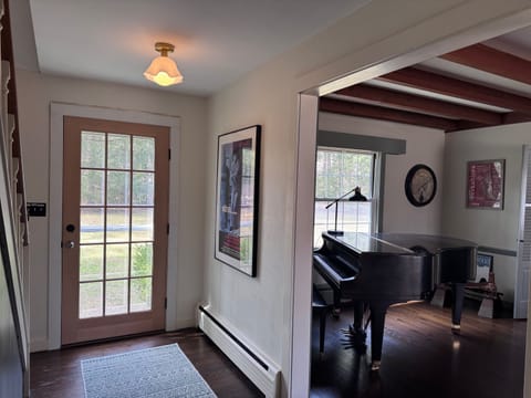 side entrance by the piano section 