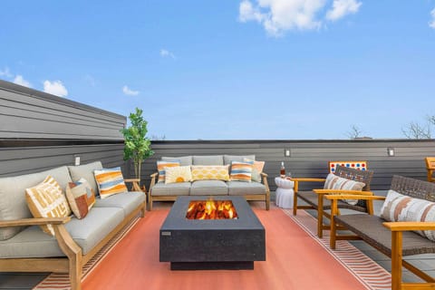 Spacious Rooftop Retreat with Cozy Fire Pit
