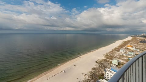 Experience seemingly endless coastline views of the horizon as waves lap the shore and the sun glistens over the water