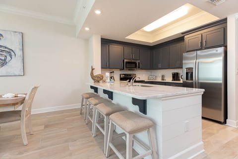 Gather around the breakfast bar for a casual meal or morning coffee