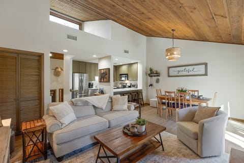Relaxing family room with high ceiling, open to the renovated kitchen.
