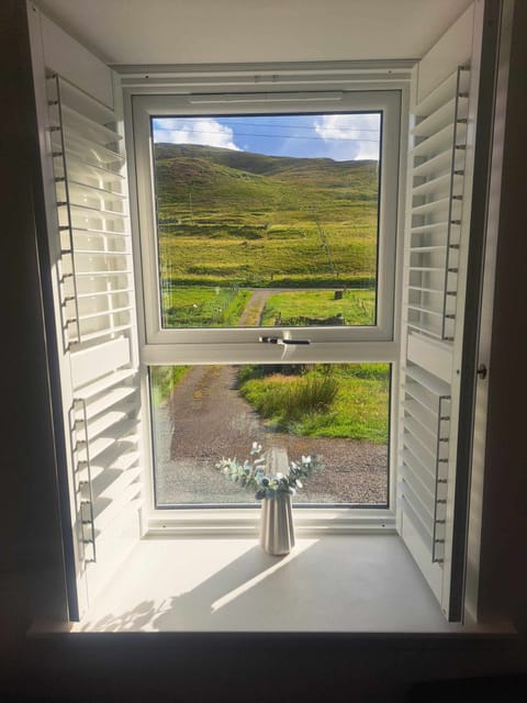 Window view facing front from Living Room/Dining Area