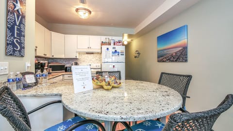 Dine in after a Day of Beach, Sun & Fun on this granite table ~ seats 4 people