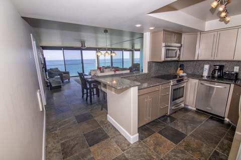 Panoramic Condo, 2 Bedrooms, Non Smoking, Ocean View | Private kitchen | Full-size fridge, microwave, oven, stovetop