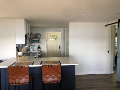 Large, quartz kitchen island.