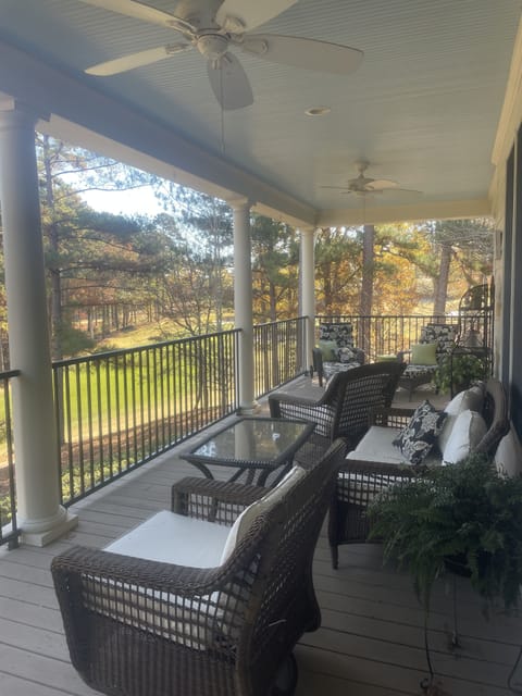 Out door living on back deck overlooking #9 fairway of The Ridge Golf Course