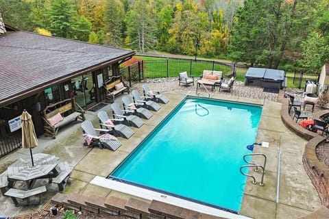Dive into relaxation in our serene pool area, complete with comfortable loungers and picturesque views of the natural surroundings.