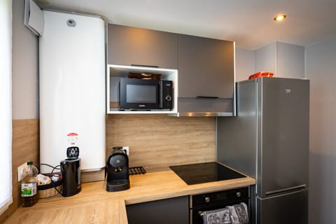 Shared fridge, microwave, espresso maker, coffee/tea maker