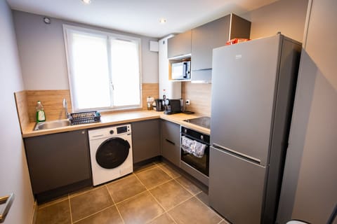 Shared fridge, microwave, espresso maker, coffee/tea maker