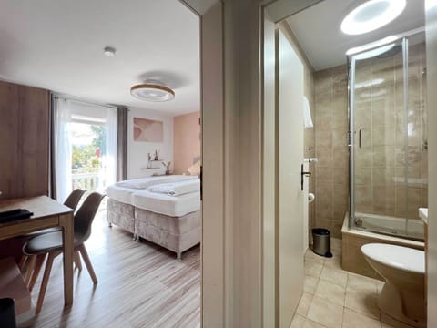 Classic Double Room, Balcony, Lake View | Hypo-allergenic bedding, minibar, in-room safe, individually decorated