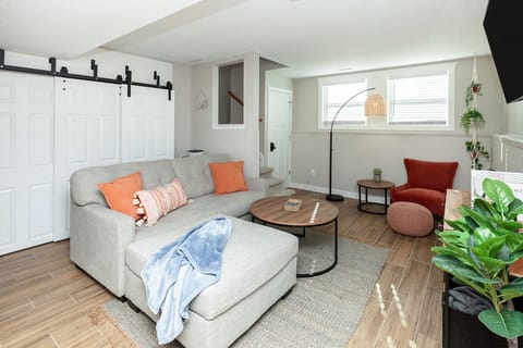 Small comfy sectional in living room. 