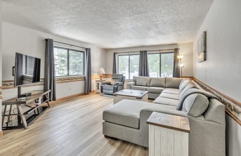 Relax in our spacious living room featuring a large sectional, perfect for group lounging. Unwind in the plush recliner, the ideal spot for leisurely afternoons. Gaze out of the window to catch a glimpse of our deer friends who often grace us with their presence. The smart TV, equipped with DirecTV, lets you catch up on your favorite shows or stream content at your leisure. Plu...