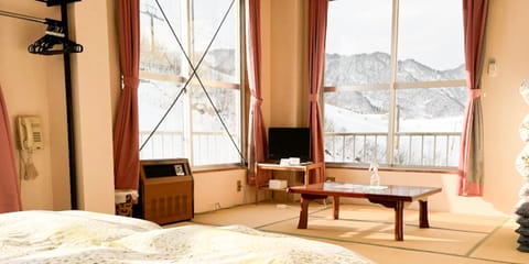 Japanese-Western style room 12 tatami, Non-smoking | Free WiFi, bed sheets