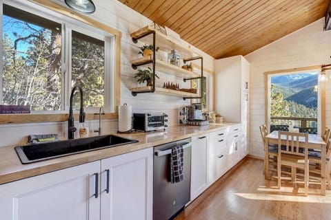 Discover culinary delights in our fully equipped kitchen, poised and ready for your favorite recipes. Unleash your inner chef and savor the joy of home-cooked meals during your stay.