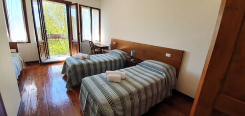 Triple Room | Down comforters, desk, laptop workspace, free WiFi