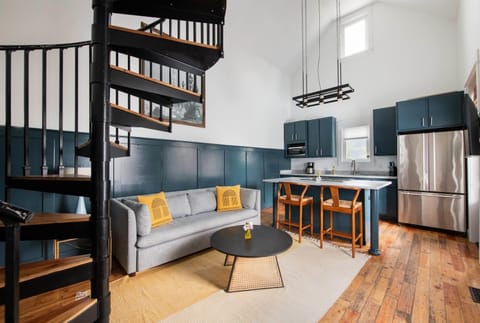 The living room allows relaxation space for your group with a sofa bed