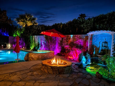 As night falls, Koi Springs transforms into a private desert oasis.