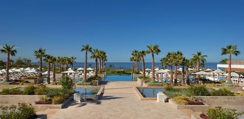 2 outdoor pools, pool umbrellas, sun loungers