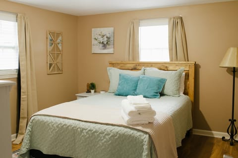 Retreat to our cozy haven, complete with a luxurious queen bed fit for restful nights and sweet dreams