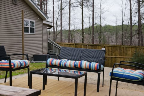 Every corner invites you to unwind and enjoy the beauty of nature in our fully fenced back yard. 
