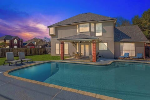 Book your trip today to Corpus Christi and come enjoy all the amenities this amazing house has to offer including a pool, 4 spacious bedrooms, a game room, and space for the entire family for a memorable getaway
