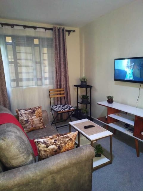 Business Studio | Living area | 24-inch Smart TV with digital channels