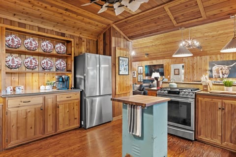 Buffett area, large refrigerator, island. 
