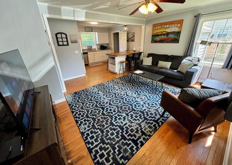 Open concept living room into fully remodeled eat-in kitchen.