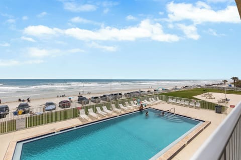 Soak up the sun by the pool with stunning ocean views just steps away from the beach. This spacious pool area offers plenty of seating and a relaxing spot to enjoy both the beach and poolside fun.