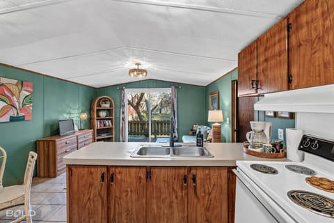 Quaint kitchen has everything you need to whip up a delicious meal & while enjoying the view!