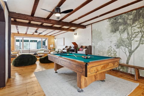 Enjoy friendly competition in one of our spacious entertainment areas featuring a pool table.