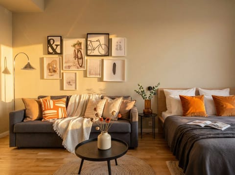 Bedroom with queen size bed and convertible sofa for up to 4 people to sleep
