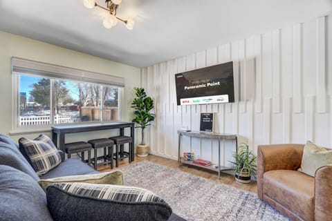 The chic and stylish decor of our living room is sure to impress and make you feel right at home.