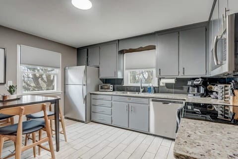 Explore our fully equipped kitchen, a culinary haven with modern appliances, ample counter space, and a comprehensive selection of utensils. From the sleek stove to the spacious refrigerator, it's designed for your culinary creativity to shine as you craft your perfect recipes.