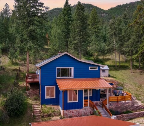 Welcome to Cobalt Peak! Step into comfort at this beautifully remodeled mountain retreat. With a charming front porch and breathtaking surroundings, relaxation begins the moment you arrive..