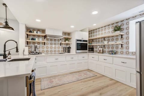 Culinary Delights Await! Our Spacious, Fully Equipped Kitchen Invites You to Craft Your Perfect Meal for an Unforgettable Vacation.